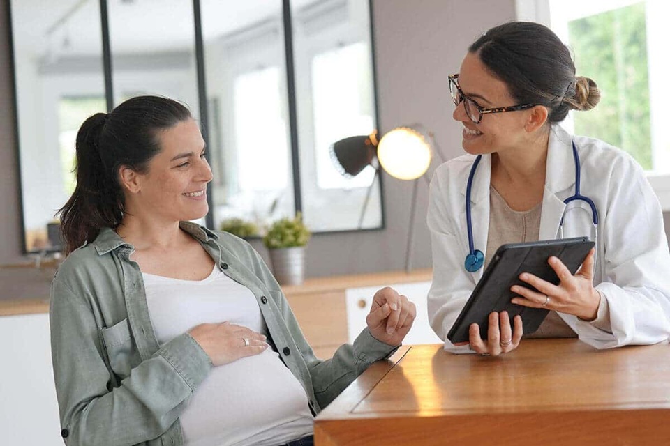 pregnant woman listening to advice